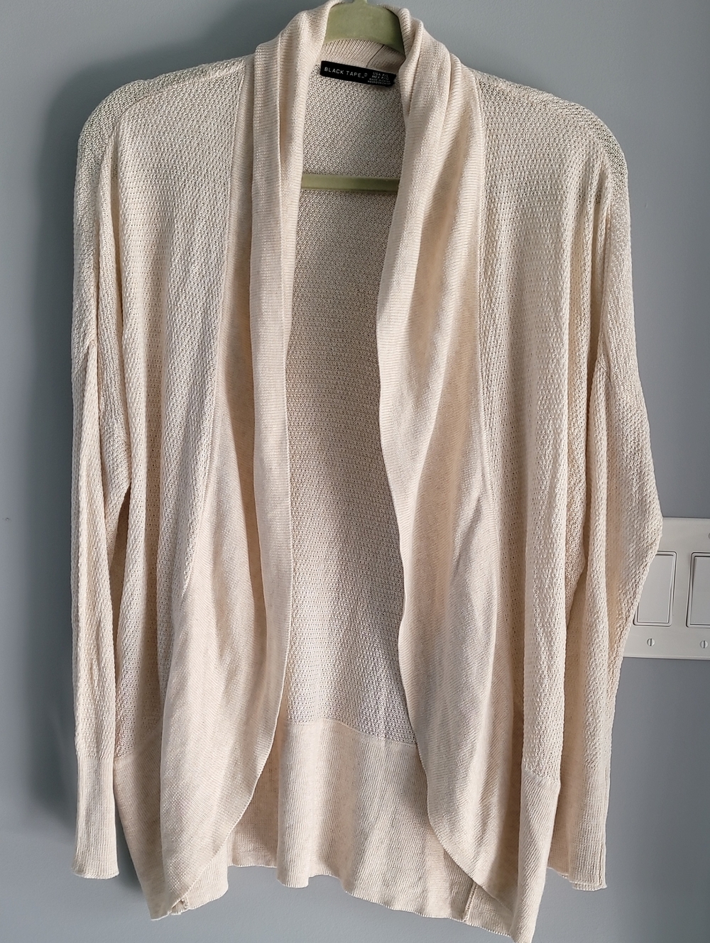 Black Tape_ Cream Open-Front Draped Cardigan